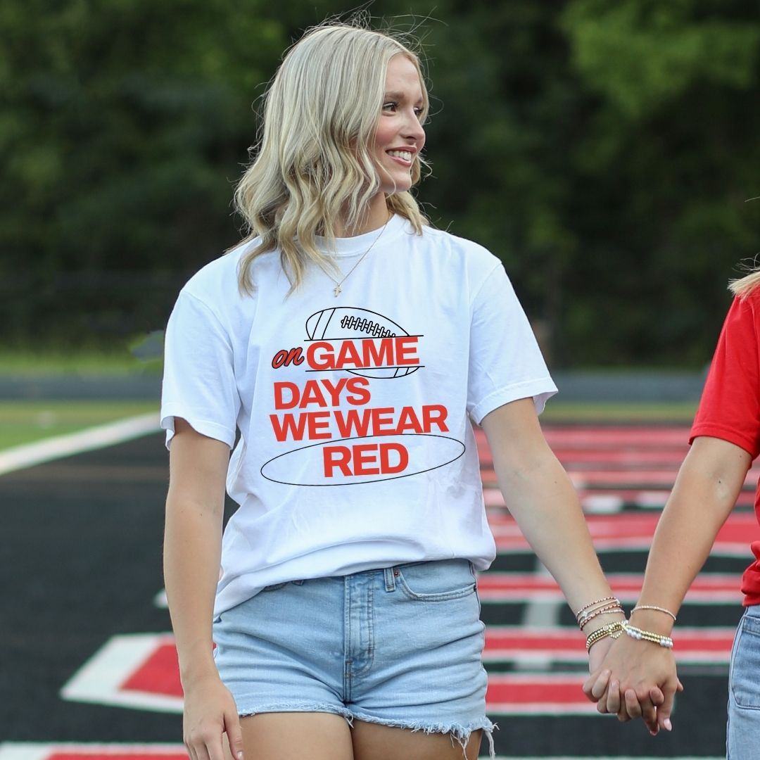 On Game Days We Wear ______ Tee