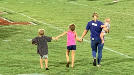 I'm a Mom and a Coach's Wife—and I'm Still Recovering from Football Season